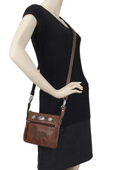 American West 9365884 Ladies Trail Rider Hip Crossbody Bag Brown on mannequin model. If you need any assistance with this item or the purchase of this item please call us at five six one seven four eight eight eight zero one Monday through Saturday 10:00a.m EST to 8:00 p.m EST