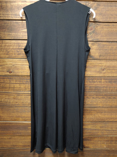 Veronica M DSS-802 Womens Penelope Surplice Ity Dress Black back view hanging. If you need any assistance with this item or the purchase of this item please call us at five six one seven four eight eight eight zero one Monday through Saturday 10:00a.m EST to 8:00 p.m EST