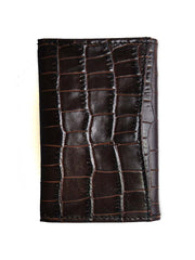 Brighton E70138 Rockefeller Card Case Dark Brown front view. If you need any assistance with this item or the purchase of this item please call us at five six one seven four eight eight eight zero one Monday through Saturday 10:00a.m EST to 8:00 p.m EST