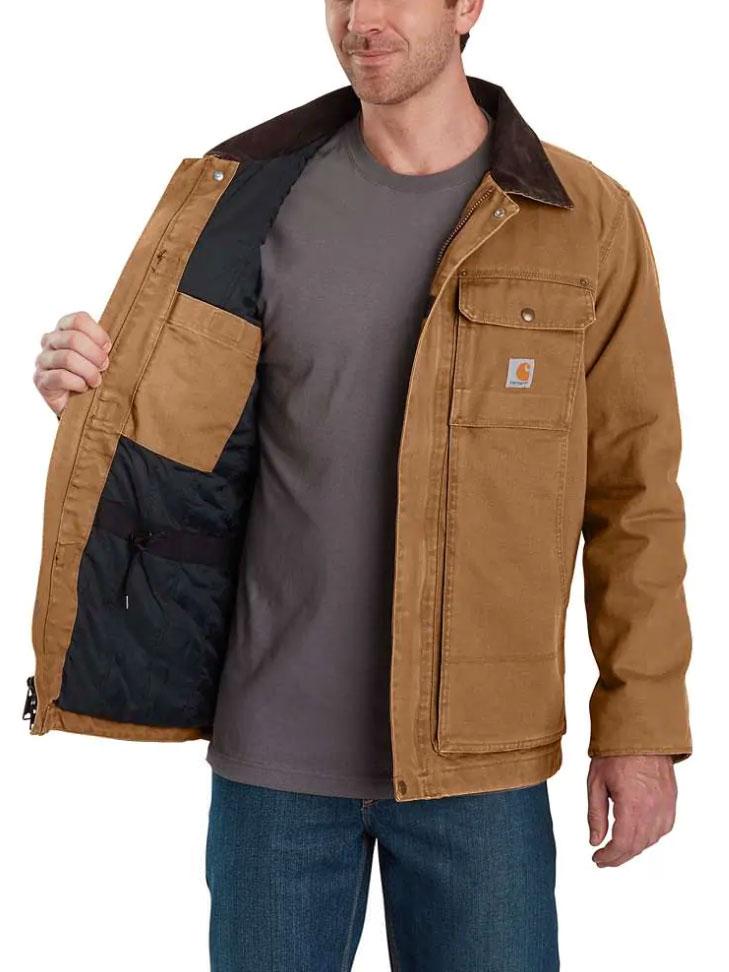 Carhartt 103283-211 Mens Full Swing Armstrong Traditional Insulated Jacket Brown front view on model. If you need any assistance with this item or the purchase of this item please call us at five six one seven four eight eight eight zero one Monday through Saturday 10:00a.m EST to 8:00 p.m EST