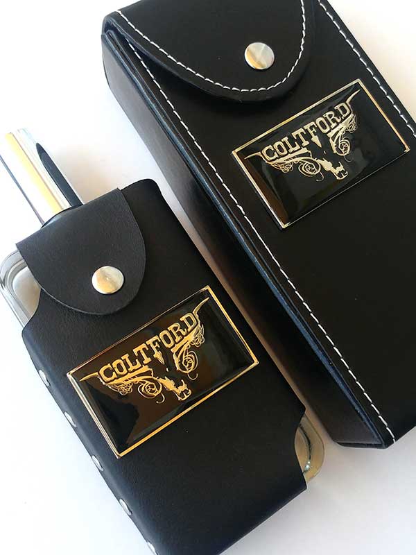Colt Ford Mens Cologne 3.4oz Authentic Spray Bottle front of bottle and case. If you need any assistance with this item or the purchase of this item please call us at five six one seven four eight eight eight zero one Monday through Saturday 10:00a.m EST to 8:00 p.m EST
