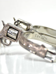 E Garcia Spurs SP2311 Authentic Revolver With Chain Floral Inlay Boot Spurs signature close up view. If you need any assistance with this item or the purchase of this item please call us at five six one seven four eight eight eight zero one Monday through Saturday 10:00a.m EST to 8:00 p.m EST