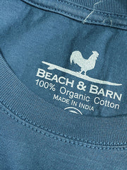 Beach & Barn EMBLEM-LS-NAVY Mens Emblem Long Sleeve Tee Navy tag close up. If you need any assistance with this item or the purchase of this item please call us at five six one seven four eight eight eight zero one Monday through Saturday 10:00a.m EST to 8:00 p.m EST