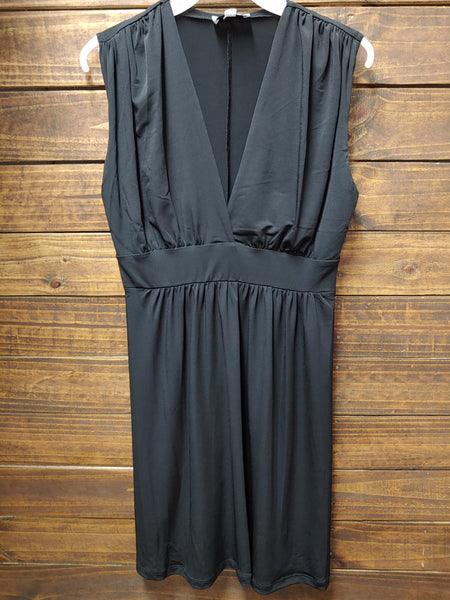 Veronica M DSS-802 Womens Penelope Surplice Ity Dress Black front view hanging. If you need any assistance with this item or the purchase of this item please call us at five six one seven four eight eight eight zero one Monday through Saturday 10:00a.m EST to 8:00 p.m EST