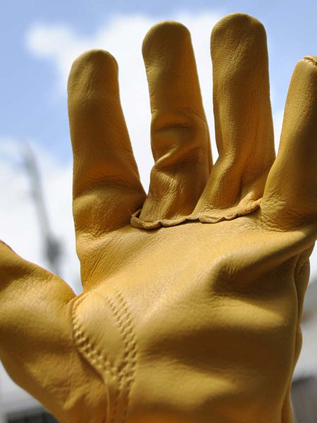 HD Xtreme Work H2110408 Mens Deer Skin Leather Gloves Tan left hand palm view. If you need any assistance with this item or the purchase of this item please call us at five six one seven four eight eight eight zero one Monday through Saturday 10:00a.m EST to 8:00 p.m EST