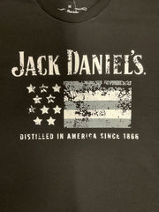 Ely Cattleman 15261452JD-89 Mens Jack Daniels Short Sleeve Flag T-Shirt Black close up. If you need any assistance with this item or the purchase of this item please call us at five six one seven four eight eight eight zero one Monday through Saturday 10:00a.m EST to 8:00 p.m EST