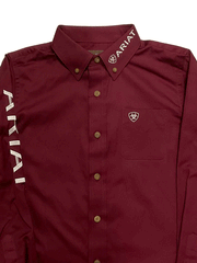 Ariat 10030163 Kids Team Logo Twill Classic Fit Shirt Burgundy frotn close up. If you need any assistance with this item or the purchase of this item please call us at five six one seven four eight eight eight zero one Monday through Saturday 10:00a.m EST to 8:00 p.m EST