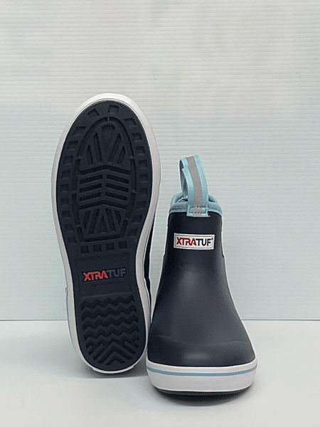 Xtratuf XWAB-201 Womens Ankle Deck Boot Navy front and sole view. If you need any assistance with this item or the purchase of this item please call us at five six one seven four eight eight eight zero one Monday through Saturday 10:00a.m EST to 8:00 p.m EST