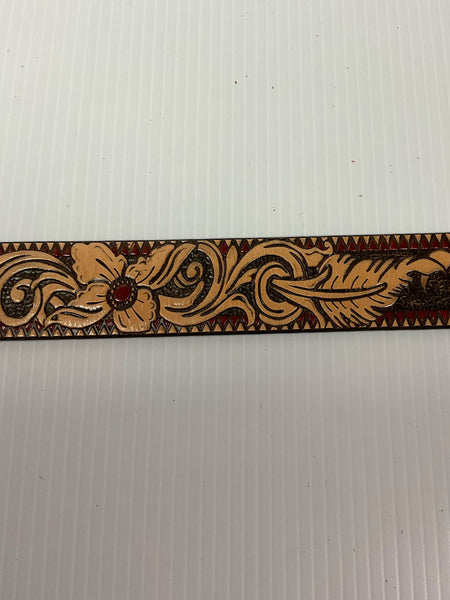 Hooey HWBLT004 Womens Feather & Floral Filigree Embossed Belt & Floral Tongue Buckle Natural Brown Red flower detail. If you need any assistance with this item or the purchase of this item please call us at five six one seven four eight eight eight zero one Monday through Saturday 10:00a.m EST to 8:00 p.m EST