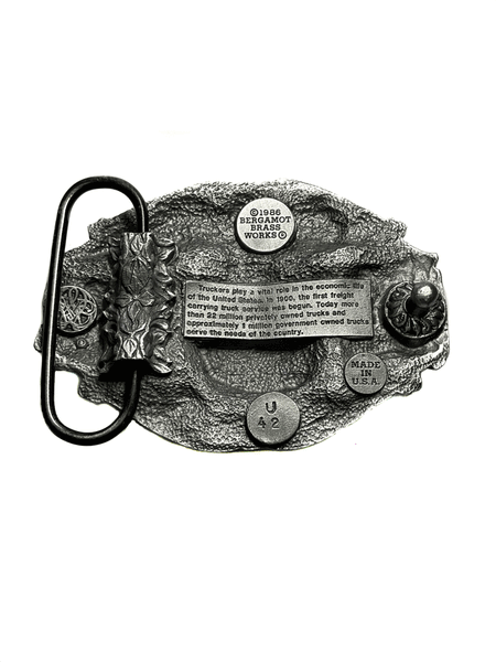 Western Express BU-007-E Proud To Be An American Trucker Belt Buckle back view. If you need any assistance with this item or the purchase of this item please call us at five six one seven four eight eight eight zero one Monday through Saturday 10:00a.m EST to 8:00 p.m EST