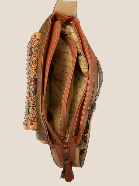Ariat A770005408 Womens Lorelei Tote Calf Hair Tooled Tan inside view. If you need any assistance with this item or the purchase of this item please call us at five six one seven four eight eight eight zero one Monday through Saturday 10:00a.m EST to 8:00 p.m EST