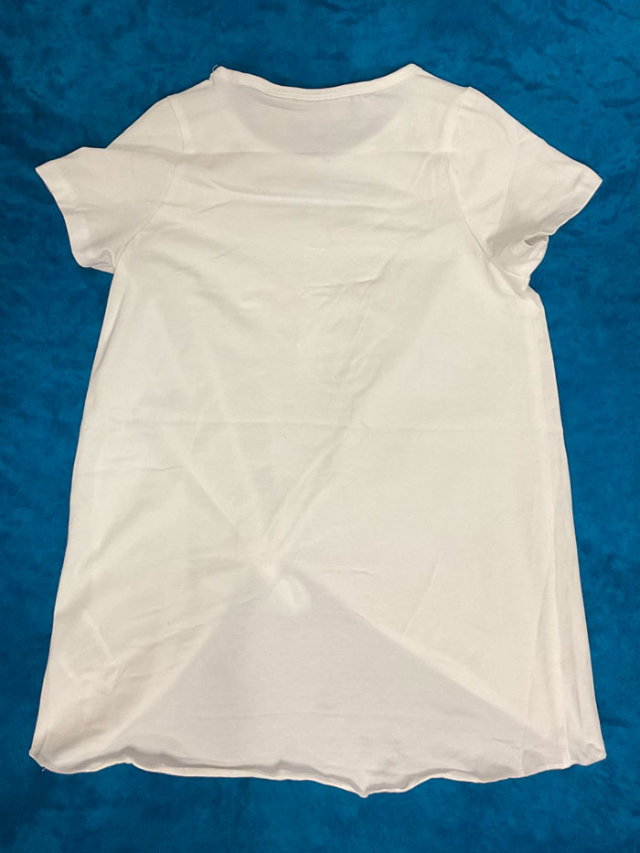 Wrangler 112329224 Kids Graphic Top White front view. If you need any assistance with this item or the purchase of this item please call us at five six one seven four eight eight eight zero one Monday through Saturday 10:00a.m EST to 8:00 p.m EST
