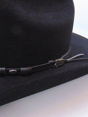 Justin JF0657TOWN-BLK Mens 6x Townes Western Felt Hat Black close up. If you need any assistance with this item or the purchase of this item please call us at five six one seven four eight eight eight zero one Monday through Saturday 10:00a.m EST to 8:00 p.m EST