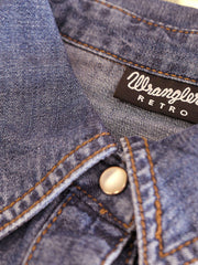 Wrangler LW7007D Womens Dark Denim Long Sleeve Western Snap Shirt front view with a girl INSIDE TAG