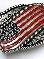 Montana Silversmiths A590P Classic Painted Waving American Flag Attitude Buckle Silver close up. If you need any assistance with this item or the purchase of this item please call us at five six one seven four eight eight eight zero one Monday through Saturday 10:00a.m EST to 8:00 p.m EST