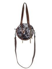 Myra Bag S-3394 Womens Concept Leather & Hair On Bag front view hanging. If you need any assistance with this item or the purchase of this item please call us at five six one seven four eight eight eight zero one Monday through Saturday 10:00a.m EST to 8:00 p.m EST