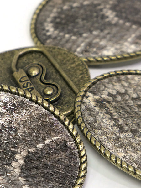 Skin Shop 121R Rattle Snake Skin Solid Brass Belt Buckle Natural close up. If you need any assistance with this item or the purchase of this item please call us at five six one seven four eight eight eight zero one Monday through Saturday 10:00a.m EST to 8:00 p.m EST