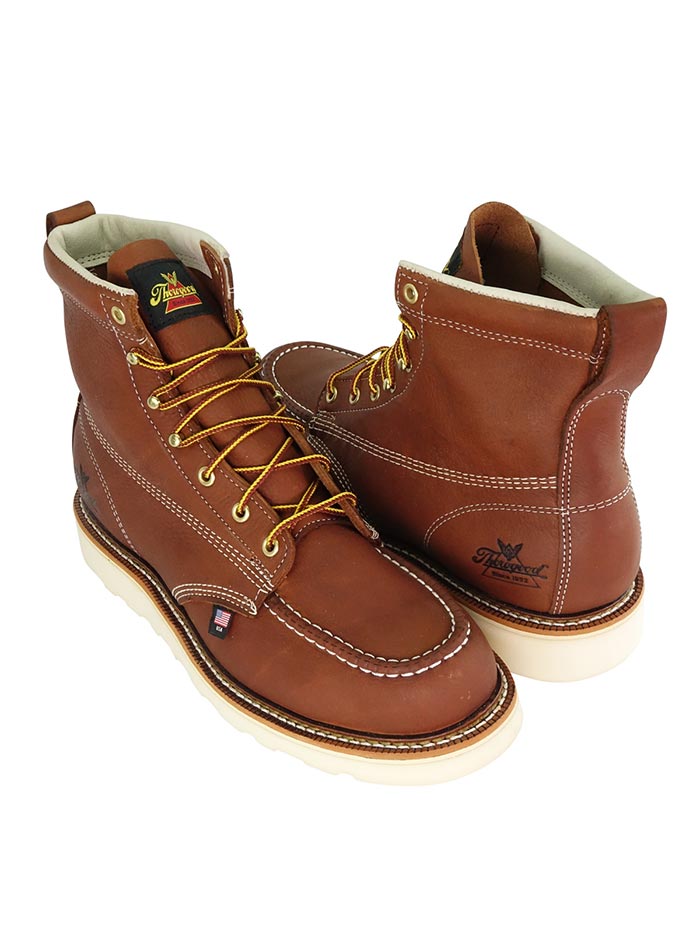 Thorogood 804-4200 Mens American Heritage 6″ Safety Toe Work Boot Tobacco side and sole view. If you need any assistance with this item or the purchase of this item please call us at five six one seven four eight eight eight zero one Monday through Saturday 10:00a.m EST to 8:00 p.m EST