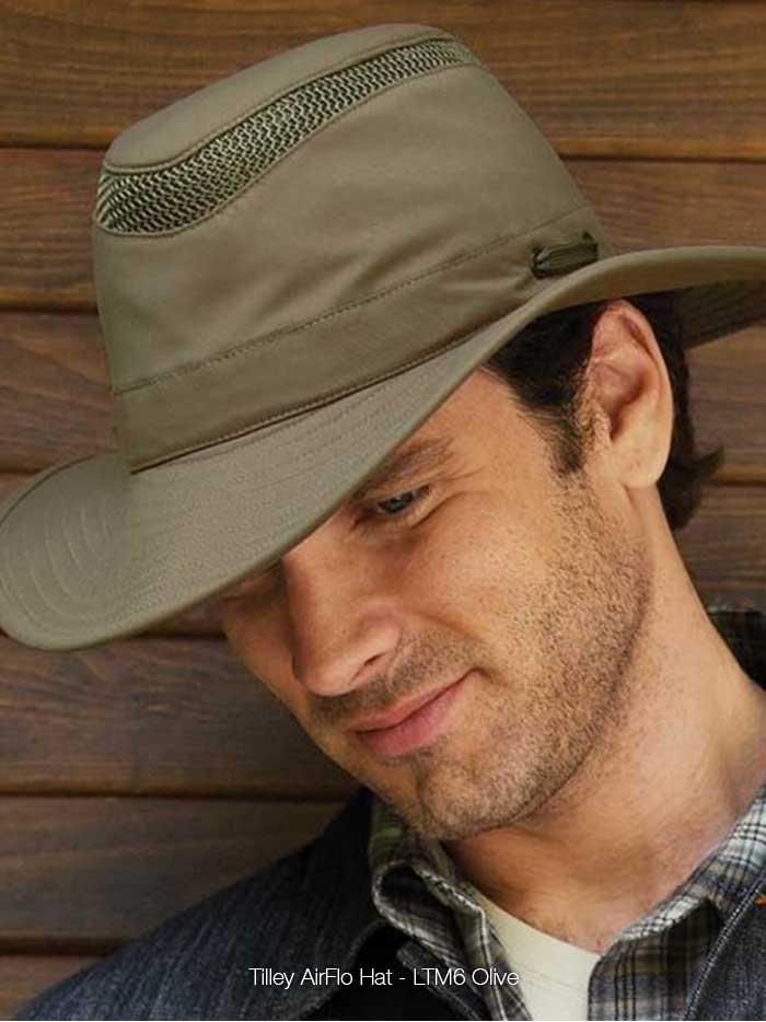 Tilley LTM6-OLIV Airflo Hat Olive front and side view on male model. If you need any assistance with this item or the purchase of this item please call us at five six one seven four eight eight eight zero one Monday through Saturday 10:00a.m EST to 8:00 p.m EST