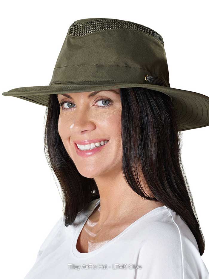 Tilley LTM6-OLIV Airflo Hat Olive front and side view on male model. If you need any assistance with this item or the purchase of this item please call us at five six one seven four eight eight eight zero one Monday through Saturday 10:00a.m EST to 8:00 p.m EST