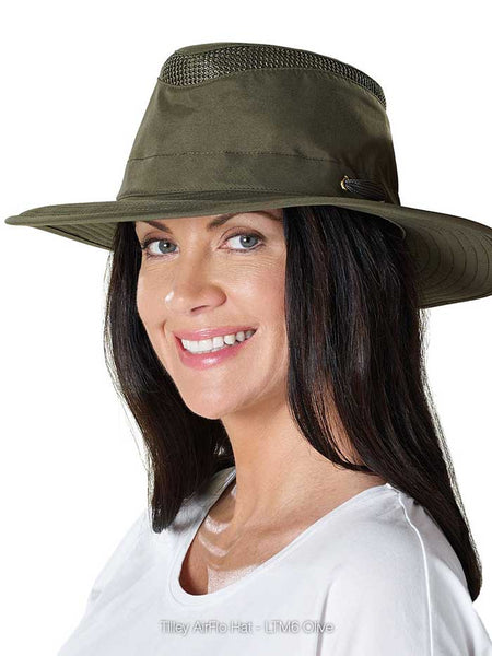 Tilley LTM6-OLIV Airflo Hat Olive front and side view on female model. If you need any assistance with this item or the purchase of this item please call us at five six one seven four eight eight eight zero one Monday through Saturday 10:00a.m EST to 8:00 p.m EST