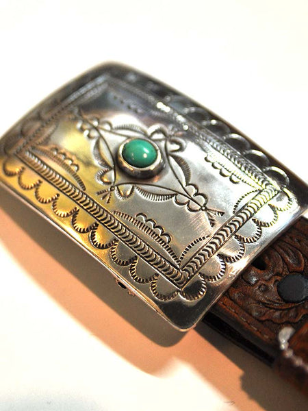 Tony Lama C50189 Womens Navajo Spirit Belt Aged Bark buckle close up. If you need any assistance with this item or the purchase of this item please call us at five six one seven four eight eight eight zero one Monday through Saturday 10:00a.m EST to 8:00 p.m EST
