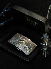 VOGT 180-004 Hand-Engraved Filigree Sterling Gold Bass Belt Buckle alternate front view in box. If you need any assistance with this item or the purchase of this item please call us at five six one seven four eight eight eight zero one Monday through Saturday 10:00a.m EST to 8:00 p.m EST