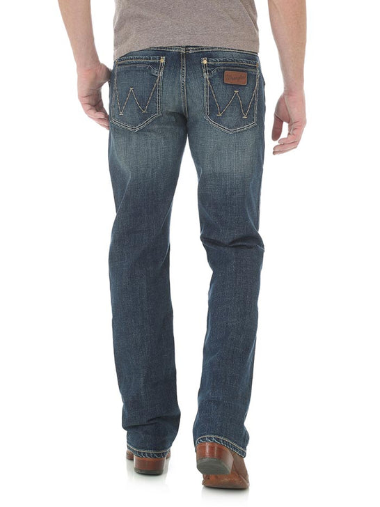 Wrangler WLT77LY Mens Retro Layton Slim Fit Bootcut Jeans Medium Wash back view. If you need any assistance with this item or the purchase of this item please call us at five six one seven four eight eight eight zero one Monday through Saturday 10:00a.m EST to 8:00 p.m EST