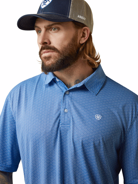 Ariat 10043339 Mens AriatTEK Performance Allover Print Polo Shirt Cobalt front close up. If you need any assistance with this item or the purchase of this item please call us at five six one seven four eight eight eight zero one Monday through Saturday 10:00a.m EST to 8:00 p.m EST