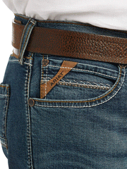 Ariat 10039625 Mens M8 Modern TekStretch Sebastian Slim Leg Jean Grafton front pocket close up. If you need any assistance with this item or the purchase of this item please call us at five six one seven four eight eight eight zero one Monday through Saturday 10:00a.m EST to 8:00 p.m EST