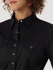 Wrangler LW1002X Ladies Western Long Sleeve Solid Shirt Black back close up. If you need any assistance with this item or the purchase of this item please call us at five six one seven four eight eight eight zero one Monday through Saturday 10:00a.m EST to 8:00 p.m EST