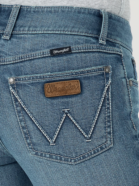 Wrangler 1009MWFNT Womens Retro Mae Mid-Rise Flare Jeans Tori back pocket detail. If you need any assistance with this item or the purchase of this item please call us at five six one seven four eight eight eight zero one Monday through Saturday 10:00a.m EST to 8:00 p.m EST