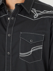 Wrangler 112317112 Mens Rock 47 Long Sleeve Embroidered Yoke Shirt Black Beauty pocket view. If you need any assistance with this item or the purchase of this item please call us at five six one seven four eight eight eight zero one Monday through Saturday 10:00a.m EST to 8:00 p.m EST