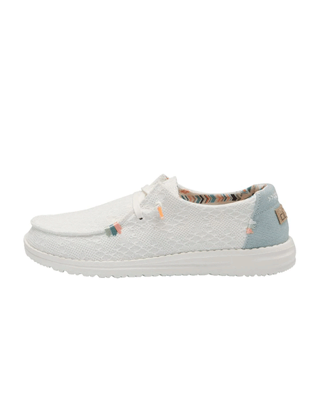 Hey Dude 121410164 Womens Wendy Boho Crochet Shoe White side view. If you need any assistance with this item or the purchase of this item please call us at five six one seven four eight eight eight zero one Monday through Saturday 10:00a.m EST to 8:00 p.m EST