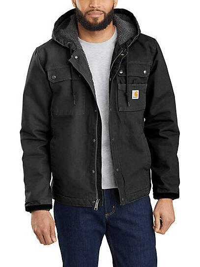 Carhartt 103826-BLK Mens Relaxed Fit Washed Duck Sherpa Lined Utility Jacket Black front view on model. If you need any assistance with this item or the purchase of this item please call us at five six one seven four eight eight eight zero one Monday through Saturday 10:00a.m EST to 8:00 p.m EST