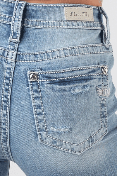 Miss Me H3636B42 Womens Classic Torn Bootcut Jeans Light Blue back pocket close up. If you need any assistance with this item or the purchase of this item please call us at five six one seven four eight eight eight zero one Monday through Saturday 10:00a.m EST to 8:00 p.m EST