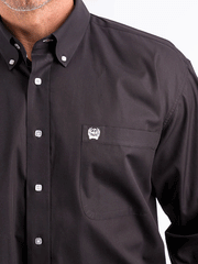 Cinch MT10320083 Mens Long Sleeve Button Down Western Shirt Solid Black front close up. If you need any assistance with this item or the purchase of this item please call us at five six one seven four eight eight eight zero one Monday through Saturday 10:00a.m EST to 8:00 p.m EST