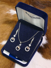 Montana Silversmiths JS4308 Hoofprints On My Heart Horseshoe Jewelry Set Silver in a case. If you need any assistance with this item or the purchase of this item please call us at five six one seven four eight eight eight zero one Monday through Saturday 10:00a.m EST to 8:00 p.m EST