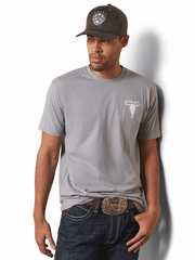 Ariat 10044771 Mens Steer Skull Flag T-Shirt Stone Heather front view. If you need any assistance with this item or the purchase of this item please call us at five six one seven four eight eight eight zero one Monday through Saturday 10:00a.m EST to 8:00 p.m EST
