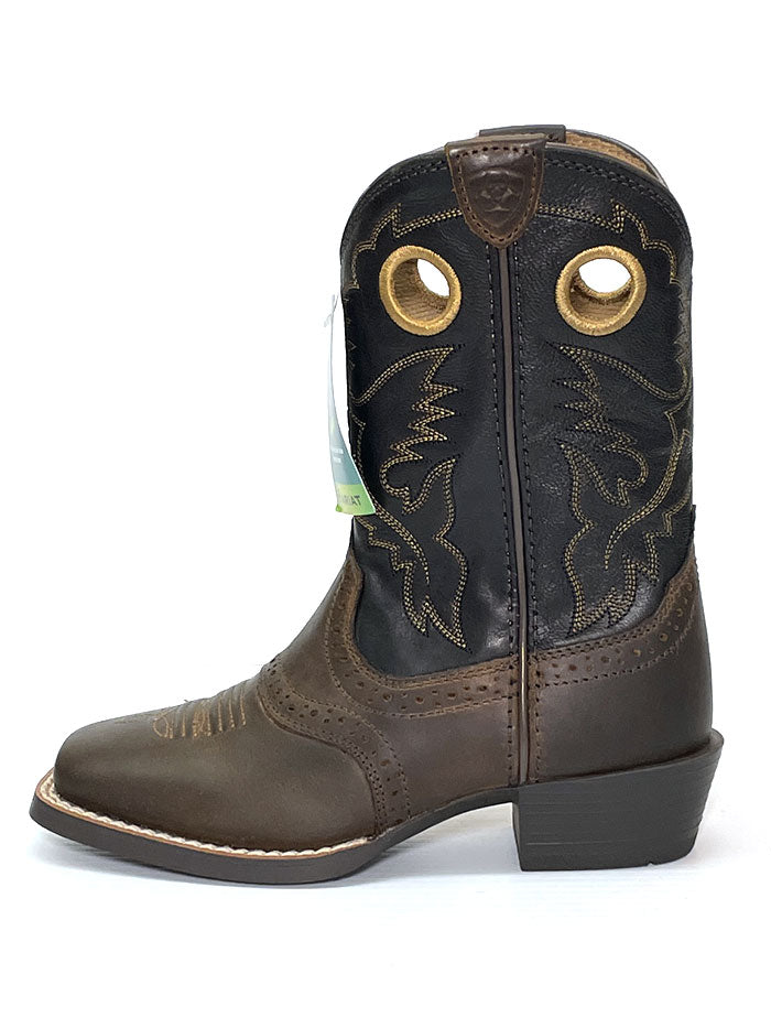 Ariat 10016239 Kids Heritage Roughstock Western Boot Distressed Brown pair.If you need any assistance with this item or the purchase of this item please call us at five six one seven four eight eight eight zero one Monday through Saturday 10:00a.m EST to 8:00 p.m EST