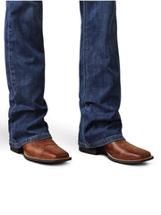 Ariat 10043146 Womens REAL Perfect Rise Leila Boot Cut Jean Irvine close up of legs. If you need any assistance with this item or the purchase of this item please call us at five six one seven four eight eight eight zero one Monday through Saturday 10:00a.m EST to 8:00 p.m EST