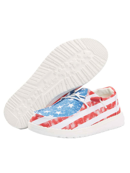 Hey Dude 121412698 Womens Wendy Shoe Star Spangled front and sole view. If you need any assistance with this item or the purchase of this item please call us at five six one seven four eight eight eight zero one Monday through Saturday 10:00a.m EST to 8:00 p.m EST