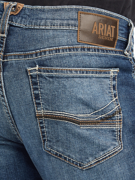 Ariat 10042204 Mens M8 Modern Kai Slim Leg Jean Kelton back pocket close up. If you need any assistance with this item or the purchase of this item please call us at five six one seven four eight eight eight zero one Monday through Saturday 10:00a.m EST to 8:00 p.m EST