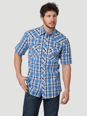 Wrangler 112314977 Mens 20X Competition Short Sleeve Plaid Shirt Blue Cloud Madras front view. If you need any assistance with this item or the purchase of this item please call us at five six one seven four eight eight eight zero one Monday through Saturday 10:00a.m EST to 8:00 p.m EST