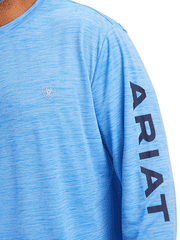 Ariat 10041002 Mens Charger Logo T-Shirt Aegean Blue sleeve close up. If you need any assistance with this item or the purchase of this item please call us at five six one seven four eight eight eight zero one Monday through Saturday 10:00a.m EST to 8:00 p.m EST