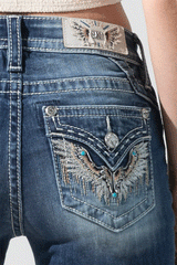 Miss Me M3080S31 Womens MM's Secret Skinny Jeans Medium Blue back pocket close up. If you need any assistance with this item or the purchase of this item please call us at five six one seven four eight eight eight zero one Monday through Saturday 10:00a.m EST to 8:00 p.m EST
