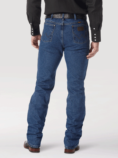 Wrangler 36MWZDS Premium Performance Cowboy Cut Slim Fit Jean Dark Stone back view. If you need any assistance with this item or the purchase of this item please call us at five six one seven four eight eight eight zero one Monday through Saturday 10:00a.m EST to 8:00 p.m EST