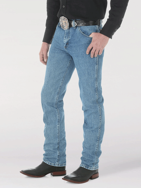Wrangler 1036MWZSW Premium Performance Cowboy Cut Slim Fit Jean Stonewash side view. If you need any assistance with this item or the purchase of this item please call us at five six one seven four eight eight eight zero one Monday through Saturday 10:00a.m EST to 8:00 p.m EST