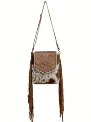 Myra Bag S-6768 Womens Squander Hand Tooled Bag Brown front view hanging.If you need any assistance with this item or the purchase of this item please call us at five six one seven four eight eight eight zero one Monday through Saturday 10:00a.m EST to 8:00 p.m EST