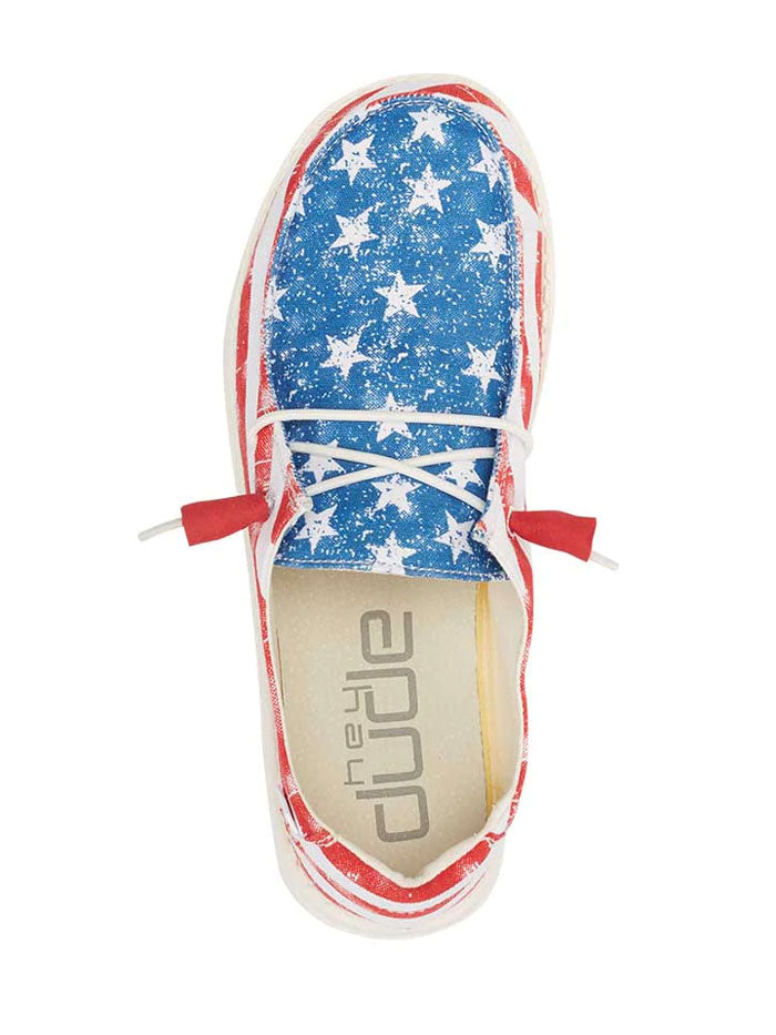 Hey Dude 121412698 Womens Wendy Shoe Star Spangled front and sole view. If you need any assistance with this item or the purchase of this item please call us at five six one seven four eight eight eight zero one Monday through Saturday 10:00a.m EST to 8:00 p.m EST